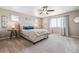 Spacious bedroom with carpeted floor and a queen-size bed at 944 Mcmurdo Cir, Castle Rock, CO 80108