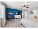 Bedroom with a blue accent wall and a dresser at 944 Mcmurdo Cir, Castle Rock, CO 80108