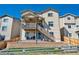 Two story home with deck and stairs leading to backyard at 944 Mcmurdo Cir, Castle Rock, CO 80108