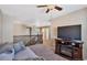 Comfortable loft area with a sitting area and built-in electric fireplace at 944 Mcmurdo Cir, Castle Rock, CO 80108
