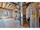 Unfinished basement with HVAC and water heater at 944 Mcmurdo Cir, Castle Rock, CO 80108