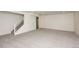 Spacious unfinished basement with neutral carpeting and stairs at 1837 Water Birch Way, Castle Rock, CO 80108