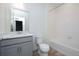 Clean bathroom with gray vanity, bathtub, and tiled shower at 1837 Water Birch Way, Castle Rock, CO 80108