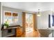 Charming breakfast nook with access to backyard deck and wooden cabinetry at 10199 Lodestone Way, Parker, CO 80134