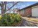 Brick home with a partially visible attached garage at 12801 Monroe St, Thornton, CO 80241