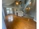 Spacious living room with hardwood floors and vaulted ceilings at 4856 S Argonne St, Aurora, CO 80015