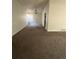 Spacious dining area with carpet flooring and a chandelier at 2721 S Salida Way, Aurora, CO 80013