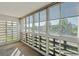 Sunroom featuring wall-to-wall windows and city views at 660 S Alton Way # 5C, Denver, CO 80247