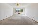 Spacious bedroom with window, ceiling fan and window AC unit at 660 S Alton Way # 5C, Denver, CO 80247