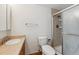 Clean bathroom with a shower/tub combo and wood vanity at 660 S Alton Way # 5C, Denver, CO 80247