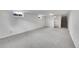 Unfinished basement with carpeted floor and stairs at 7131 Clay St, Westminster, CO 80030