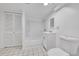 Clean basement bathroom with a tub, toilet and vanity at 7131 Clay St, Westminster, CO 80030