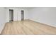 Spacious basement bedroom with light wood flooring at 7131 Clay St, Westminster, CO 80030