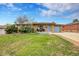 Ranch style home with attached garage and landscaped yard at 7131 Clay St, Westminster, CO 80030