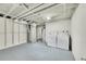 Basement laundry room with washer, dryer, and water heater at 7131 Clay St, Westminster, CO 80030