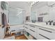 Bathroom with double vanity and shower/tub combo at 1555 California St # 316, Denver, CO 80202