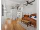 Main bedroom with hardwood floors and walk-in closet at 1555 California St # 316, Denver, CO 80202