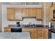 Well-equipped kitchen with ample cabinet space and granite countertops at 1555 California St # 316, Denver, CO 80202