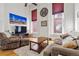 Spacious living room with hardwood floors and ample natural light at 1555 California St # 316, Denver, CO 80202