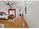 Large bedroom with hardwood floors and king-size bed at 1555 California St # 316, Denver, CO 80202