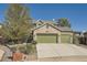 Two-story house with green doors and stone accents at 13159 Bellaire Ct, Thornton, CO 80241