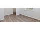 Empty study with wood-look flooring and white walls at 3482 N Highlands Creek Pkwy, Aurora, CO 80019