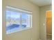 Bedroom with window offering a view of nature at 7822 S Kittredge Cir, Englewood, CO 80112