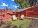 Cozy backyard seating area with shade sail at 3863 E Briarwood Ave, Centennial, CO 80122