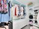 Spacious closet with hanging rods and shelving at 3863 E Briarwood Ave, Centennial, CO 80122