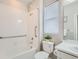Clean bathroom with shower/tub, grab bars, and vanity at 711 N Waterloo Ct, Aurora, CO 80018