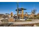 Community park with modern pergola and seating areas at 711 N Waterloo Ct, Aurora, CO 80018