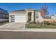 Modern two-story home with attached garage and landscaped yard at 711 N Waterloo Ct, Aurora, CO 80018
