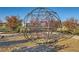 Modern playground with a large rope climbing structure at 711 N Waterloo Ct, Aurora, CO 80018