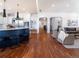 Modern kitchen boasting a large island, stainless steel appliances, and stylish cabinetry at 385 Baxter Farm Ln, Erie, CO 80516