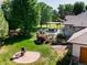 Landscaped backyard with patio and seating area at 385 Baxter Farm Ln, Erie, CO 80516