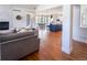 Open floor plan showcasing living room, kitchen, and dining area at 385 Baxter Farm Ln, Erie, CO 80516