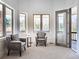 Relaxing sitting area with two armchairs and access to outdoor space at 385 Baxter Farm Ln, Erie, CO 80516