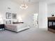Spacious main bedroom with fireplace and ensuite bathroom at 385 Baxter Farm Ln, Erie, CO 80516