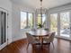 Charming breakfast nook with hardwood floors and access to backyard patio at 385 Baxter Farm Ln, Erie, CO 80516