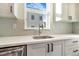 Modern kitchen sink and countertops with white cabinets at 5870 W 91St Ave, Westminster, CO 80031