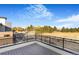 Spacious rooftop deck with city views and a modern railing at 5870 W 91St Ave, Westminster, CO 80031