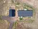 Aerial view showing house and detached garage at 165 S County Road 197, Byers, CO 80103
