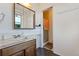 Bathroom with vanity, sink, and shower at 213 23Rd Ave, Longmont, CO 80501