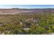 Wide aerial view of home and mountain backdrop at 19815 W Top O The Moor Dr, Monument, CO 80132