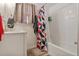 Updated bathroom with white subway tiles and a new vanity at 1599 W Beekman Pl Pl, Denver, CO 80221