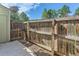 Private backyard with wooden fence and gate at 1649 S Ivory Cir # D, Aurora, CO 80017