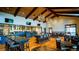 Spacious dining area with wooden floors and modern light fixtures at 3015 Newfound Lake Rd, Berthoud, CO 80513
