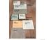 Samples of tiles, countertops, flooring, cabinet paint, and handrail stain at 16594 W 93Rd Way, Arvada, CO 80007
