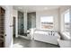 Spa-like bathroom with walk-in shower and large tub at 37057 Still Rock Pt, Elizabeth, CO 80107