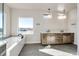 Bathroom with double vanity and large window view at 37057 Still Rock Pt, Elizabeth, CO 80107